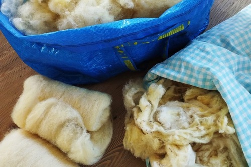 Van ongewassen wol naar gekaarde wol